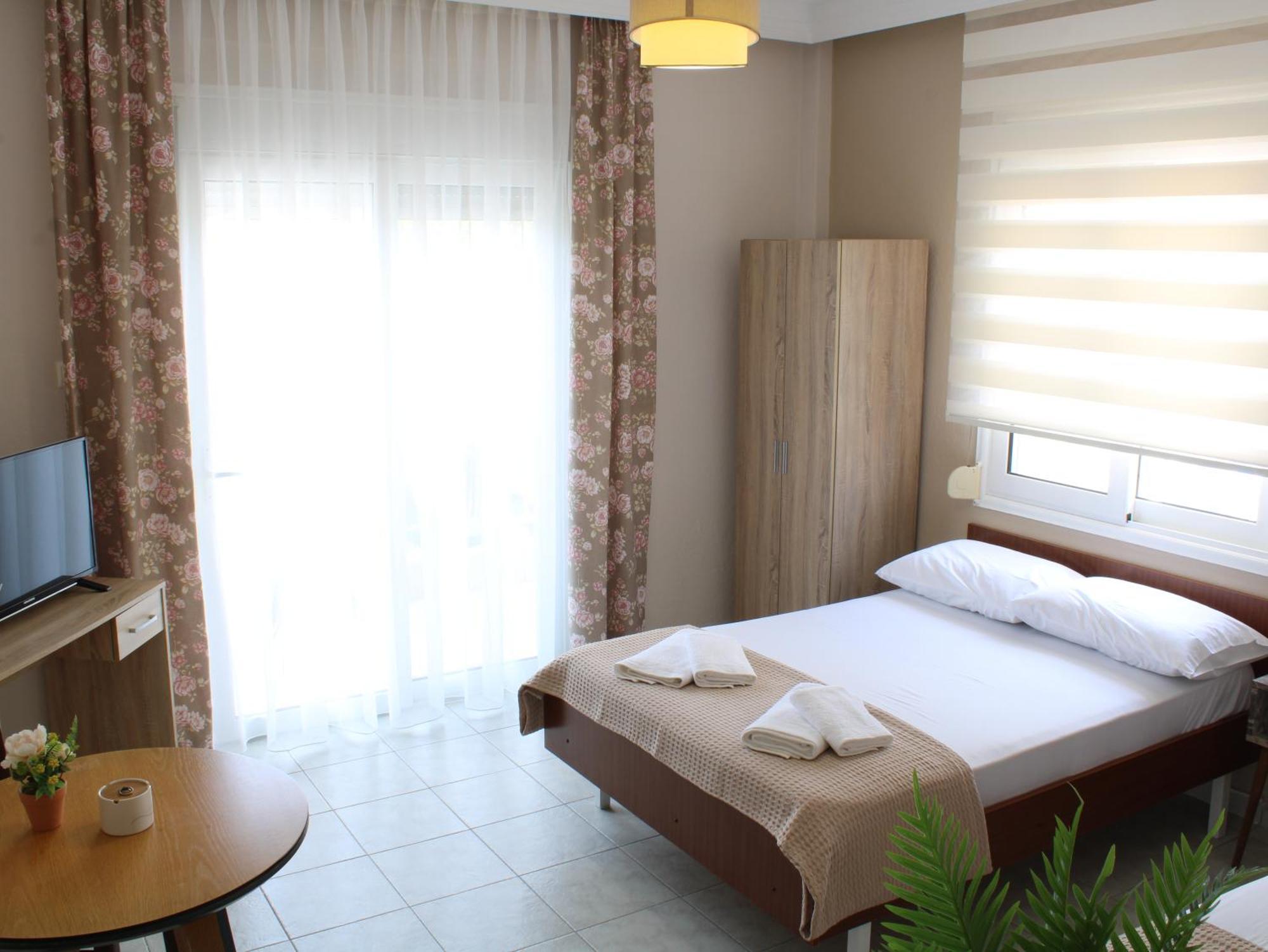 Sunshine Apartments By The Sea Skala Neon Epivaton Luaran gambar